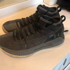 Under Armour shoes with tiny while in the side